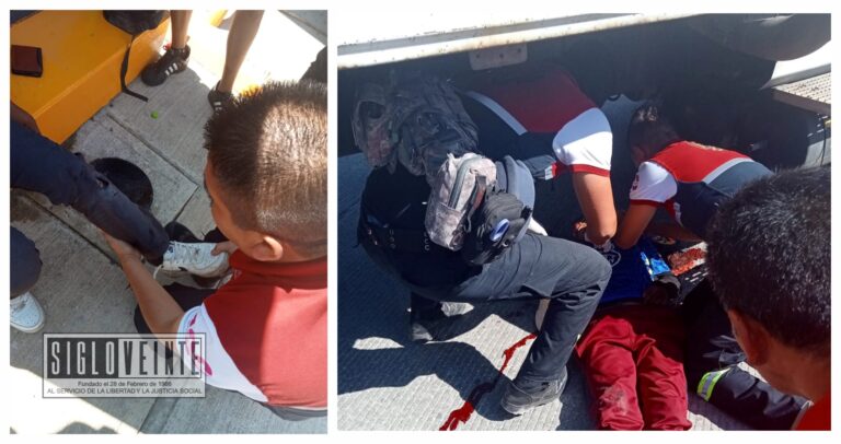 Colisionan dos motos de frente y terminan debajo de un camión que estaba a punto de arrancar