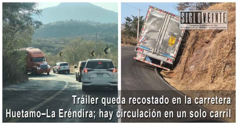 Tráiler queda recostado en la carretera Huetamo–La Eréndira; la circulación se mantiene en un solo carril