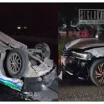 Choque deja un taxi volcado y dos heridos en el acceso a la ciudad de Apatzingán